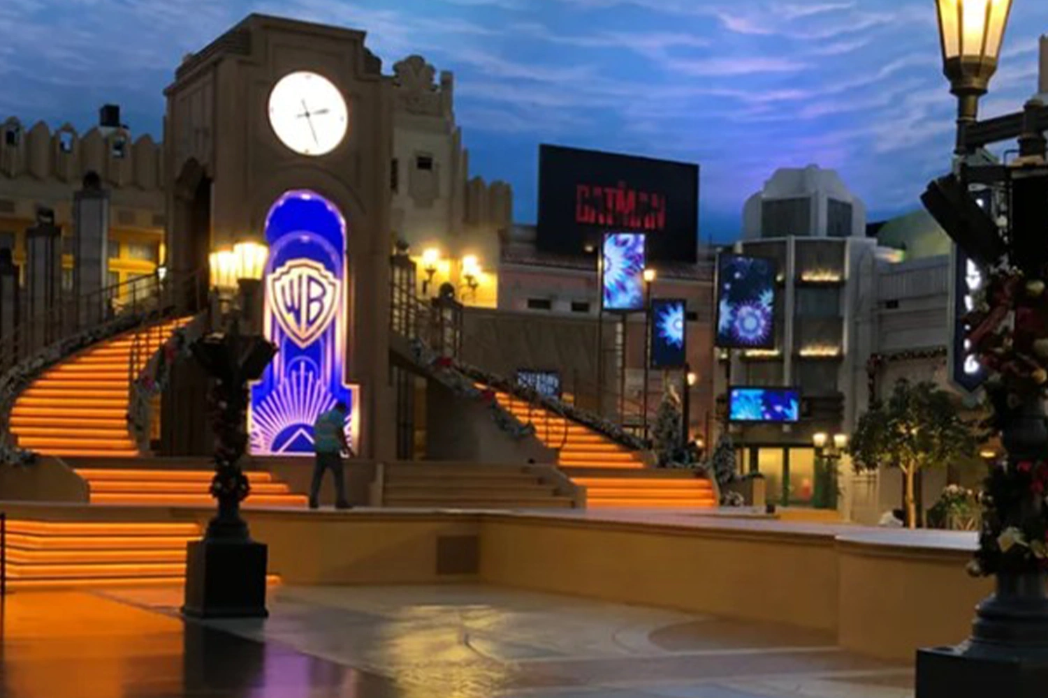 Evolution Scenic illuminated Art Deco stage with clock tower, staircases and integrated video displays.