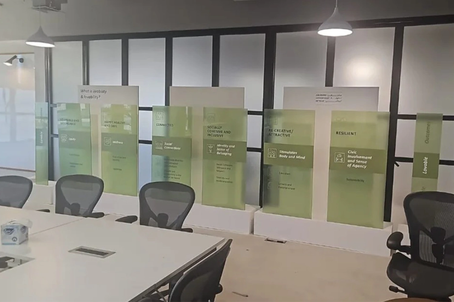 Coordinated ADEO scenic installation combining MDF walls, acrylic displays and printed graphics.