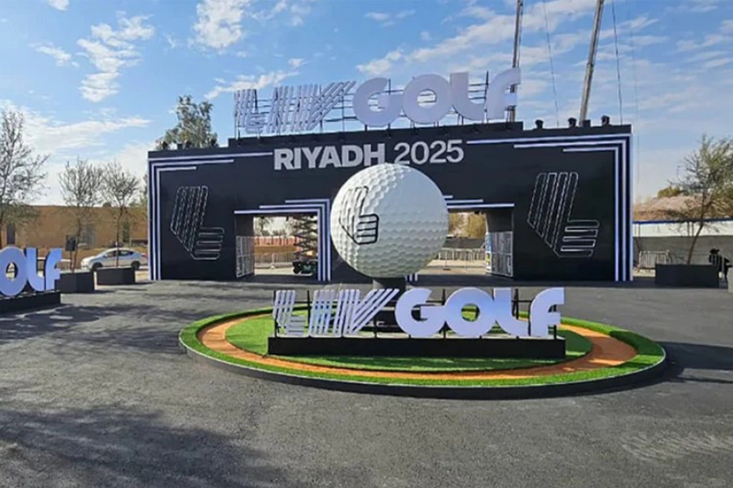Daytime view of the scenic entrance portal and circular rotating golf-ball feature.