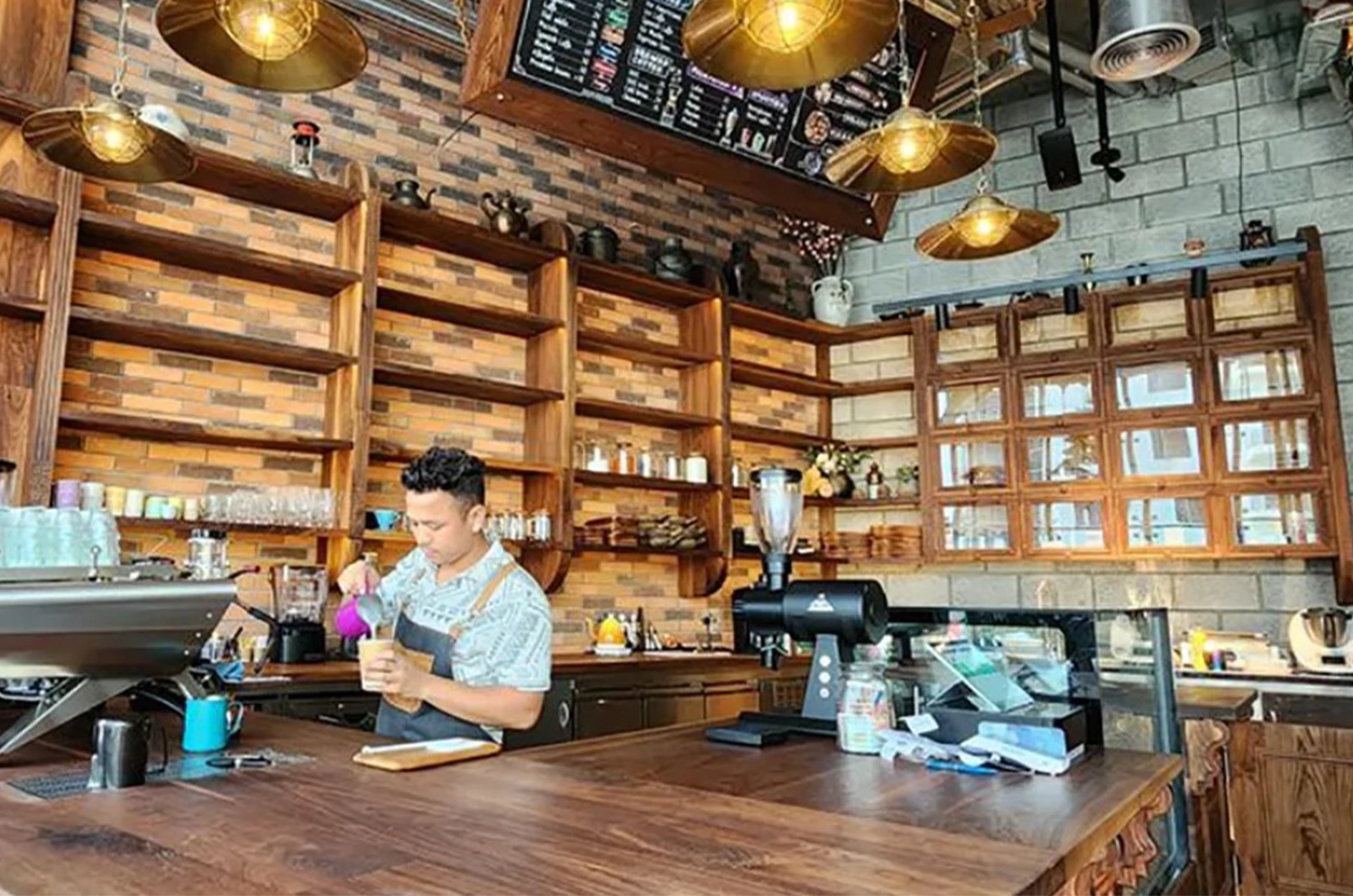 Evolution Scenic solid walnut service counter and shelving at Pedjas Kraft Coffee Shop.

