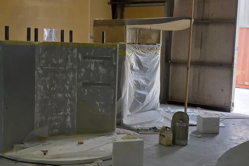 Evolution Scenic installing modular scenery inside a finished venue environment