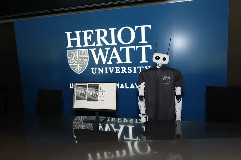 Evolution Scenic large-format Heriot-Watt branded wall graphics installed within the Climate Hub environment.