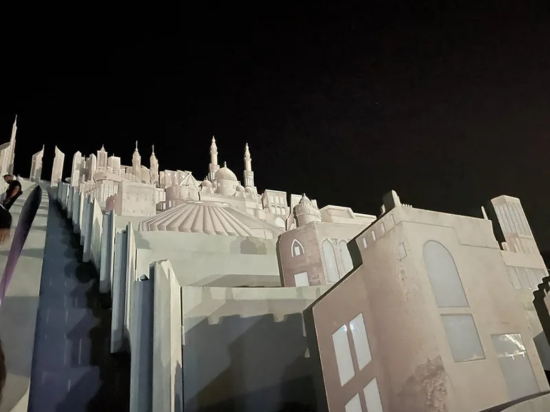 Multi-tier telescopic scenic buildings representing iconic architecture from across the UAE.
