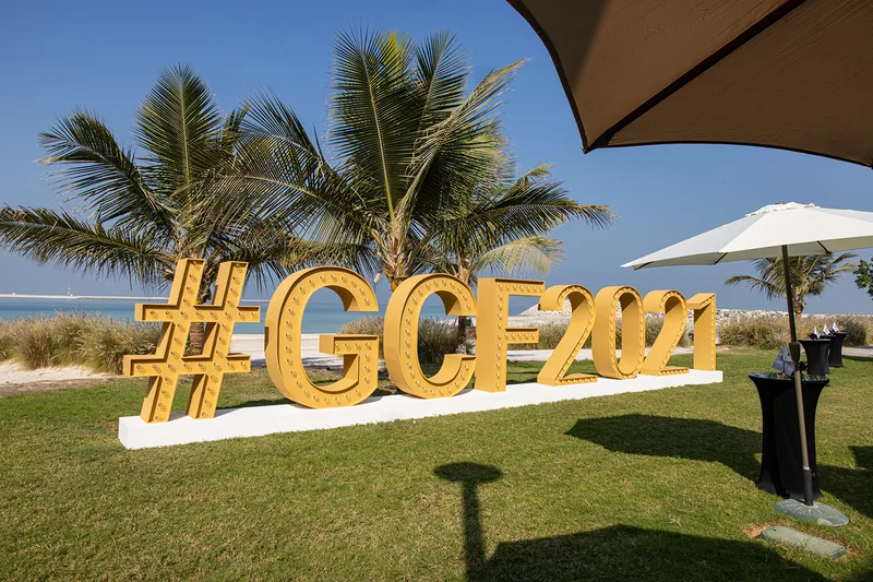 Evolution Scenic freestanding GCF2021 illuminated letter signage installed within the Global Citizen Forum outdoor environment.
