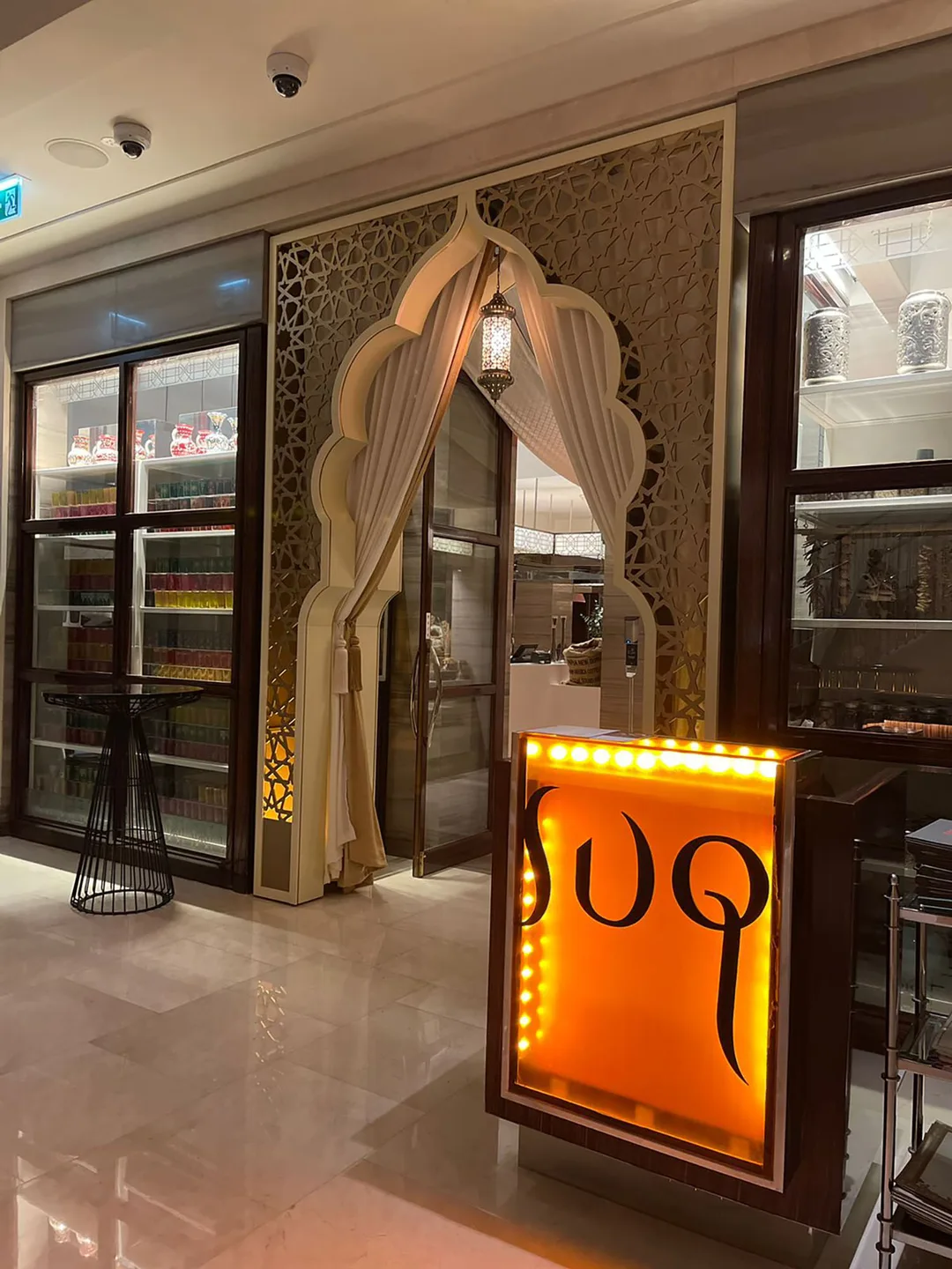 Fairy-light installation integrated across the Ramadan scenic environment at SUQ Restaurant.