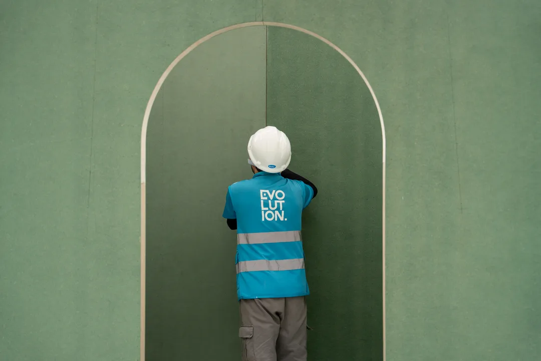 Evolution Scenic installers joining modular scenic walls with accessible concealed connections
