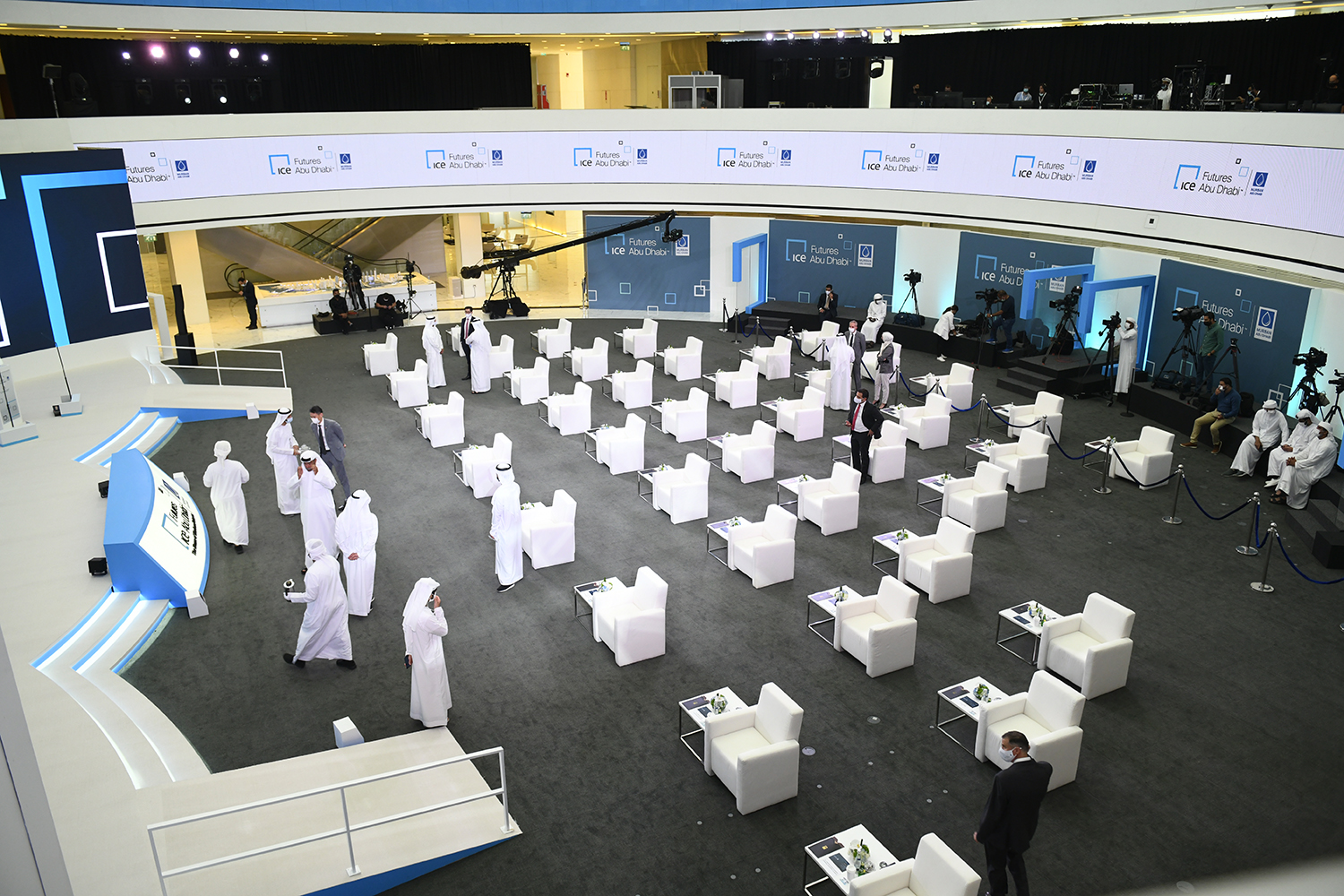 Integrated screen openings built into the large-format curved scenic backdrop at ADGM.