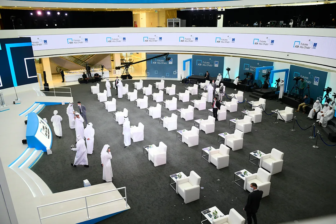 Integrated screen openings built into the large-format curved scenic backdrop at ADGM.