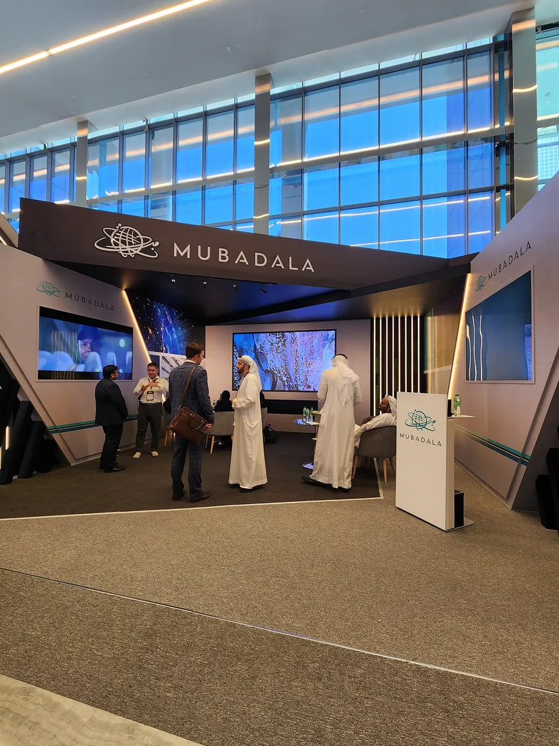 Evolution Scenic exhibition frontage combining metal framing, MDF cladding and integrated content screens.