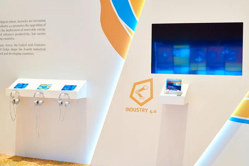 Evolution Scenic technology mounting system integrated into a custom UNIDO exhibition panel.