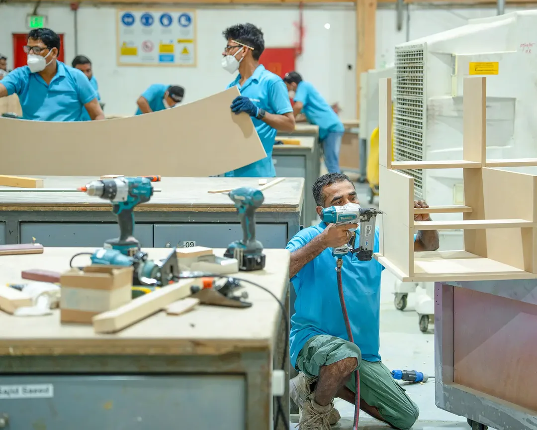 Evolution Scenic workshop coordinating machining, assembly, finishing and packing.
