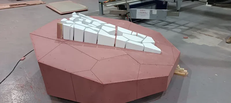 Evolution Scenic layered MDF fabrication forming the geometric upper scenic surfaces.
