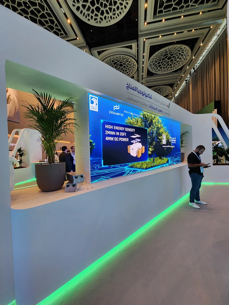 UAE Climate Tech exhibition walls with printed vinyl graphics and LED skirting.