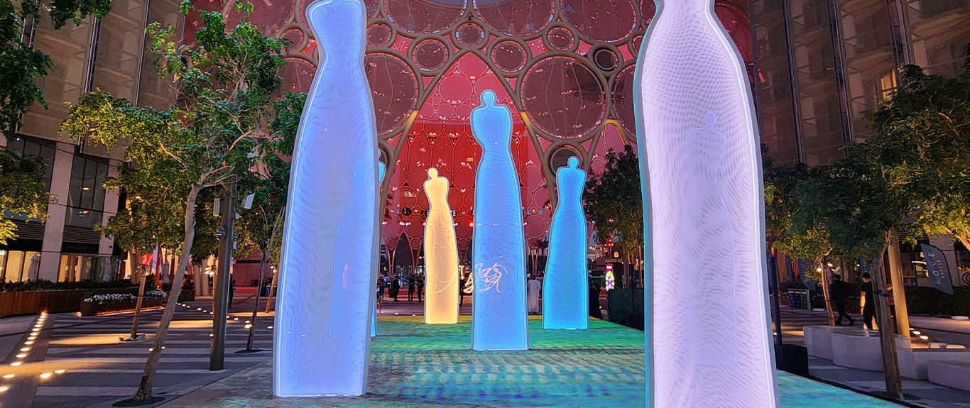 Seven interconnected Musk Spectre figures extending across the 180-square-
metre installation area
