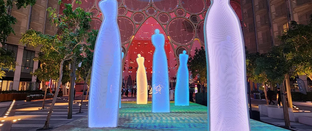 Seven interconnected Musk Spectre figures extending across the 180-square-
metre installation area
