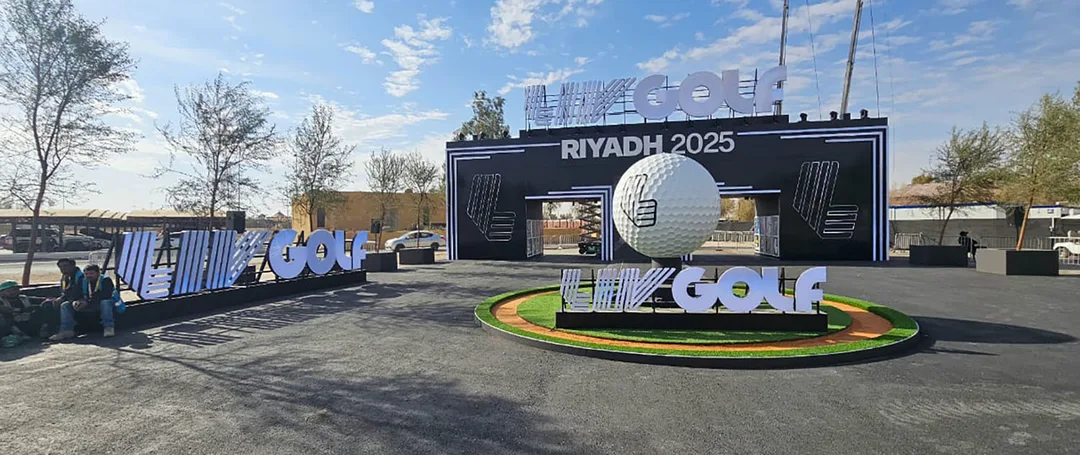 Daytime view of the scenic entrance portal and circular rotating golf-ball feature.