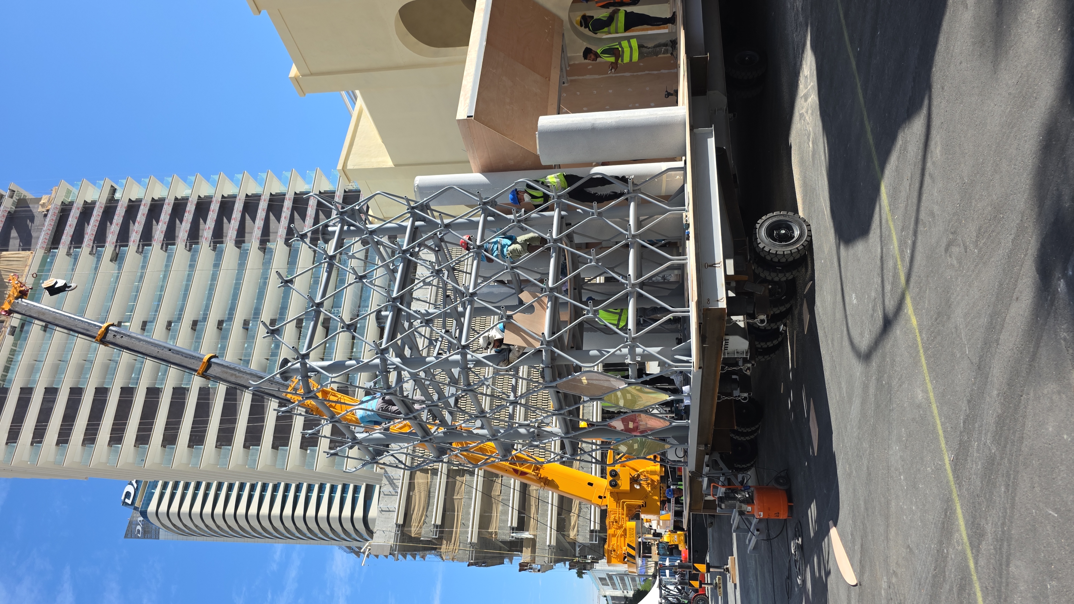 Tall mobile scenic frame engineered with low concentrated structural mass

