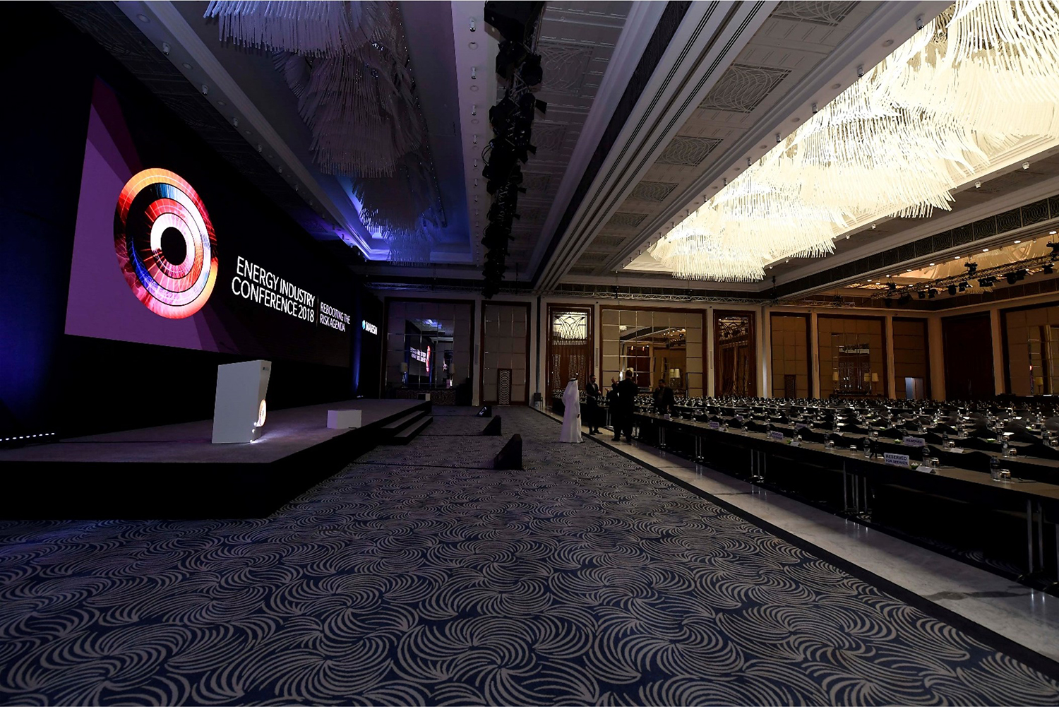 Evolution Scenic fabricated black conference stage backdrop and screen surround for Marsh in Dubai.