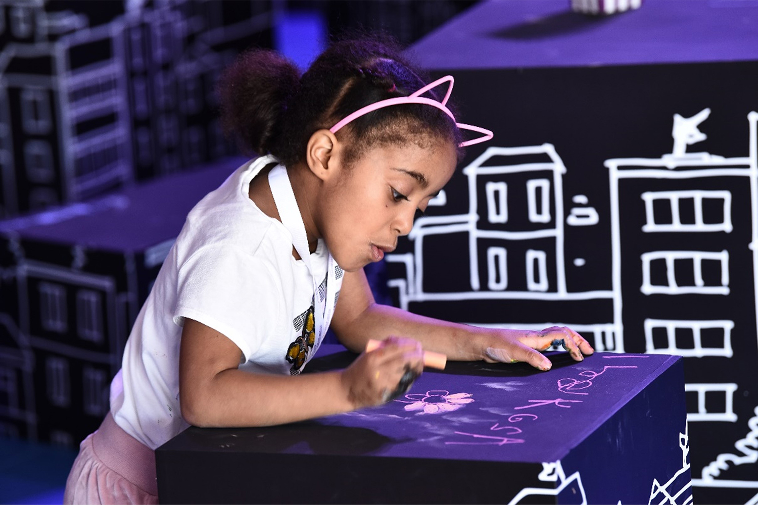 Evolution Scenic modular scenic panels defining the children’s creative workshop environment.
