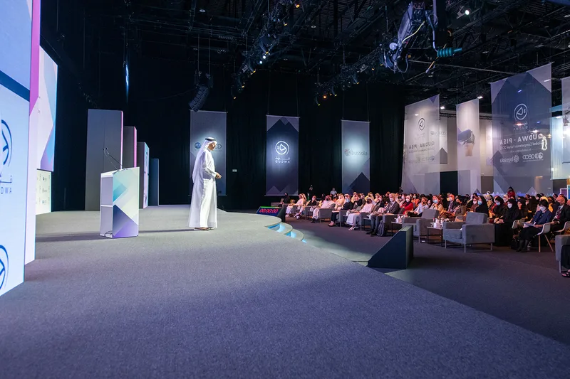 Main stage backdrop combining scenic construction and integrated display technology.
