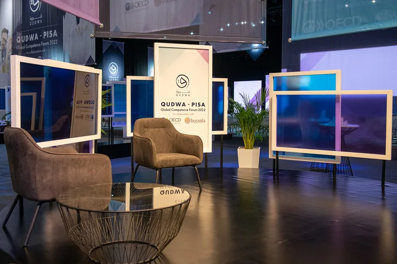 Freestanding Media Hub panels with coloured transparent surfaces and printed graphics.