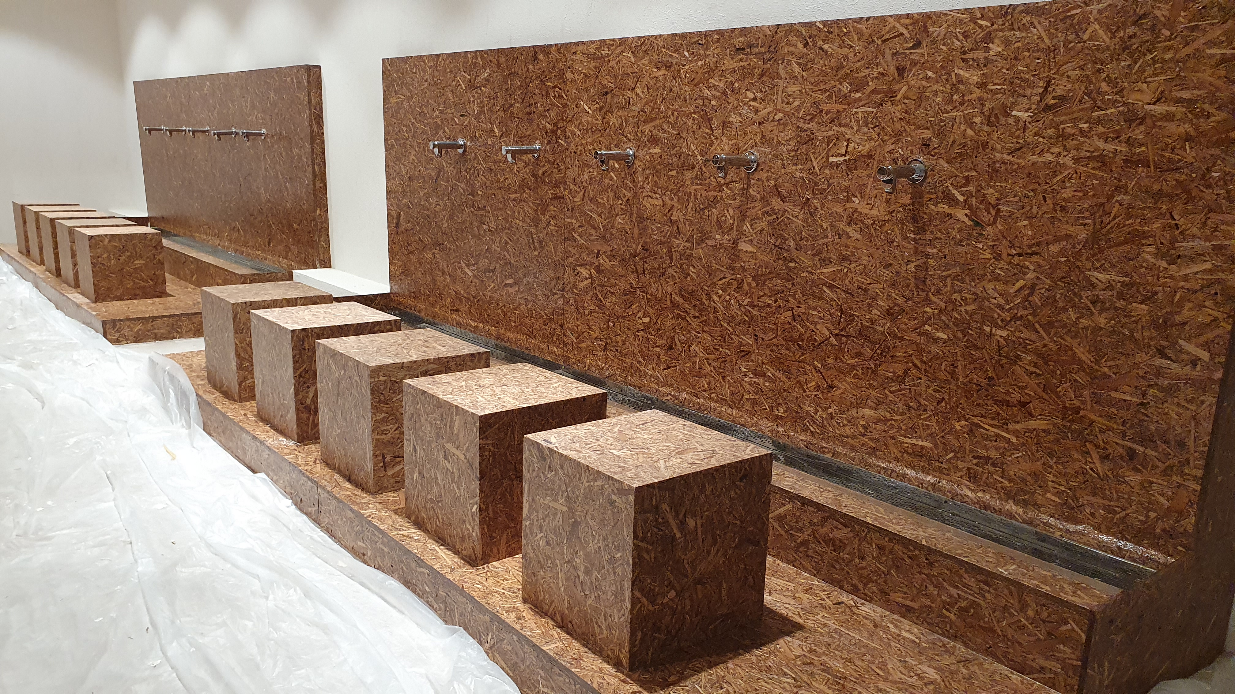 Men’s ablution area with Evolution Scenic plumbing, fittings and vinyl flooring. 