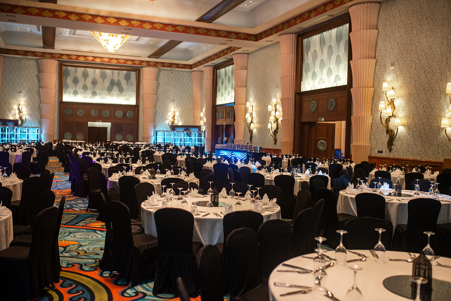 Evolution Scenic branded gala stage and scenic backdrop for Roche Dubai.