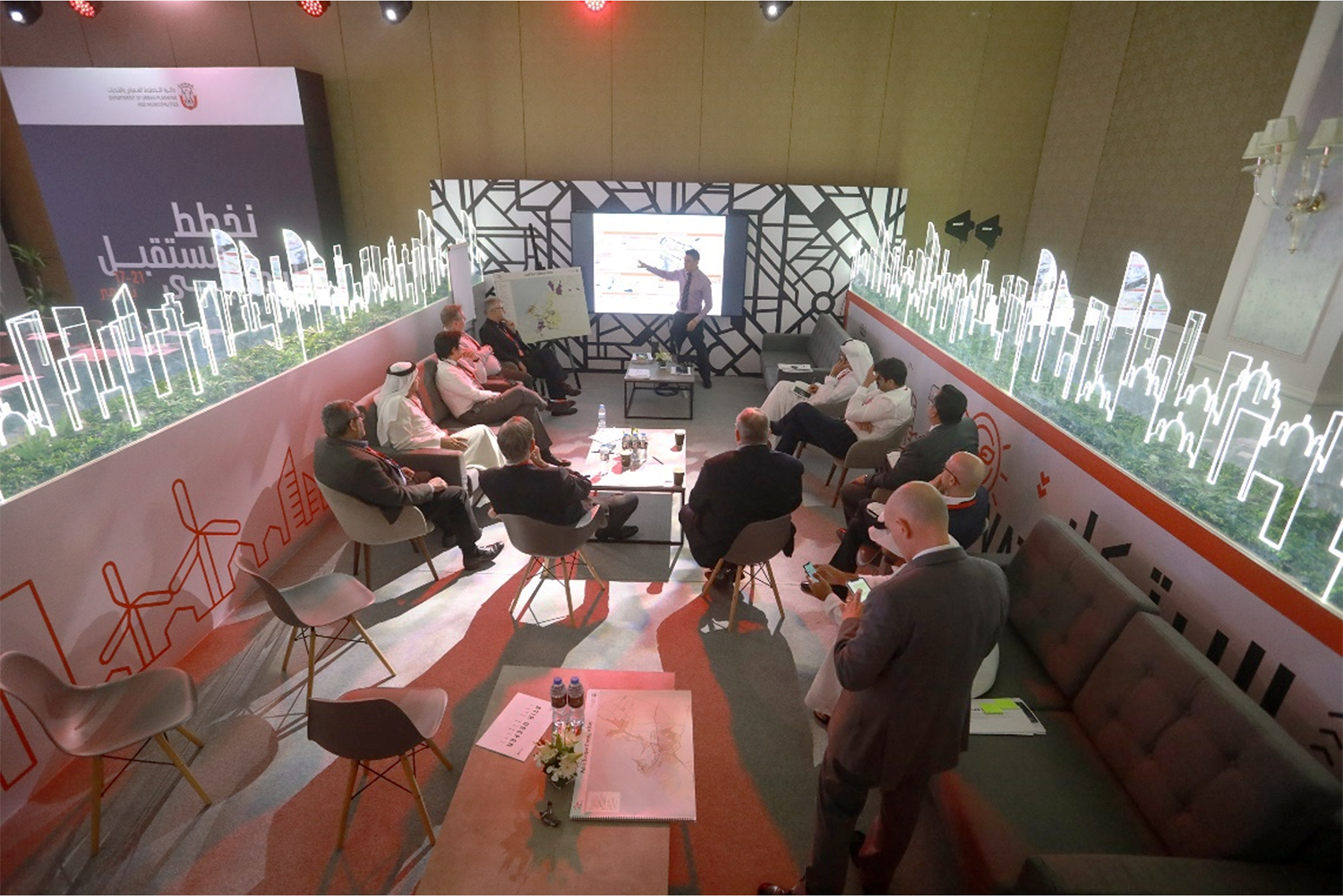 Custom graphic walls dividing the ballroom into fourteen individual workshop environments.