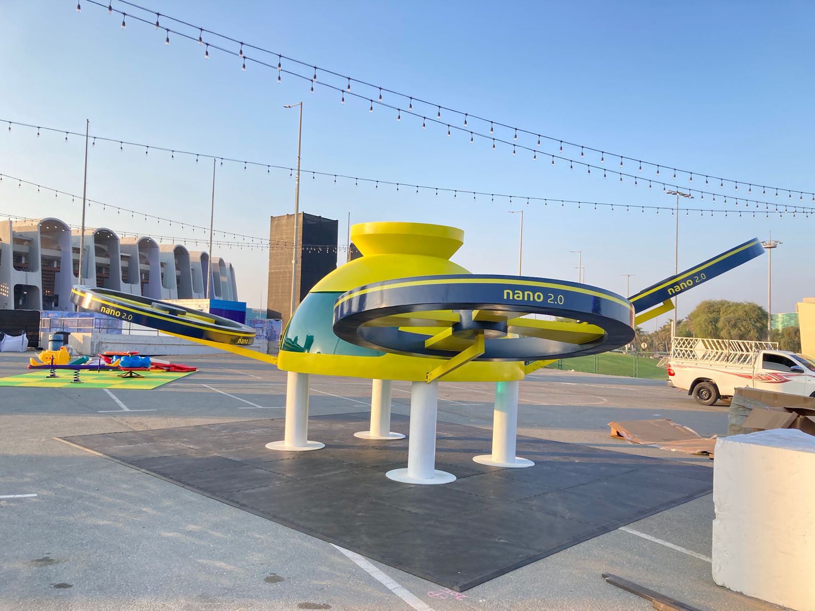 Completed freestanding robot installation on protective rubber flooring at Mansour Festival.
