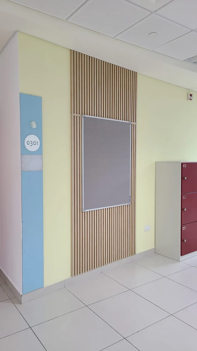 Evolution Scenic school fit-out combining graphics, joinery, seating and acoustic treatments.