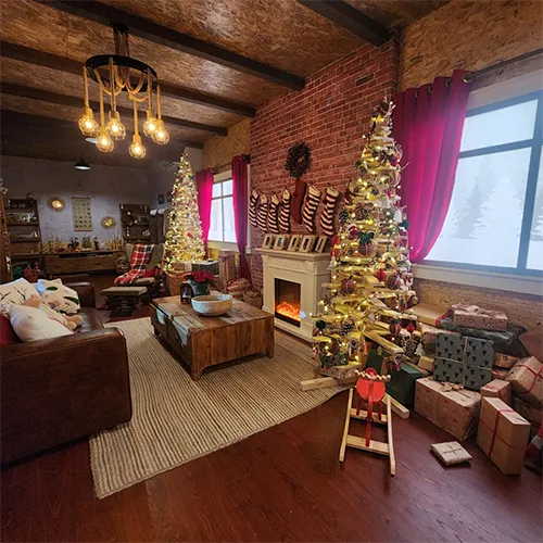 Refurbished giant Christmas bauble seating pod surrounded by decorative ornament props