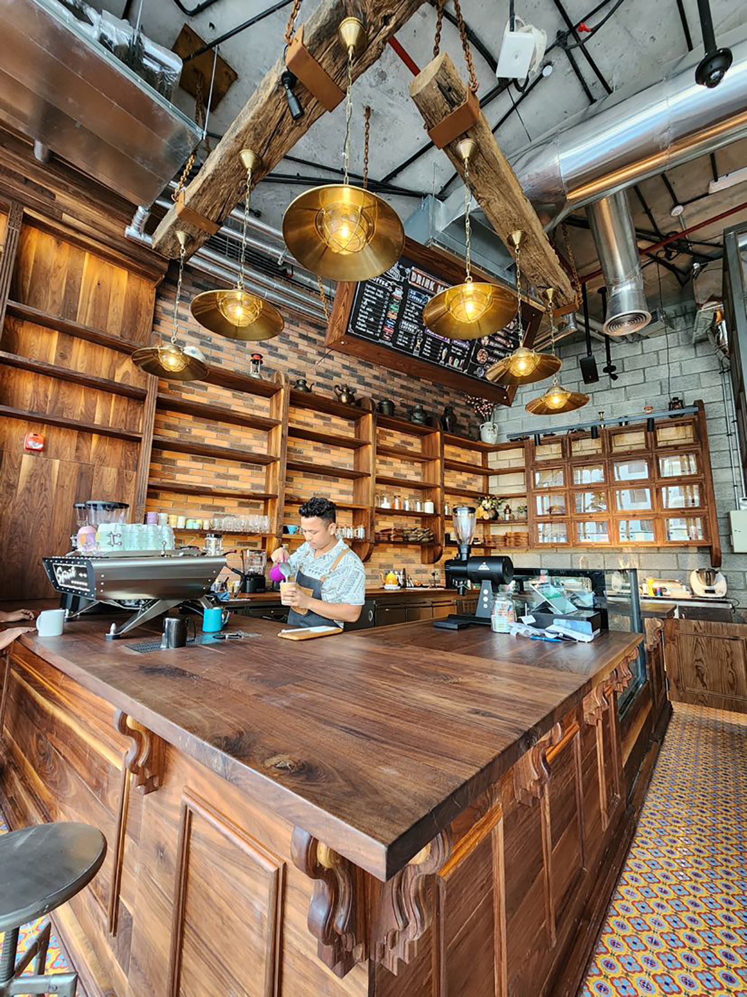 Evolution Scenic solid walnut service counter and shelving at Pedjas Kraft Coffee Shop.

