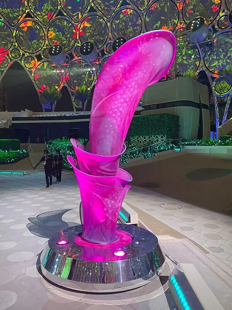 Evolution Scenic sculptural petals twisting through the programmed kinetic blooming sequence.