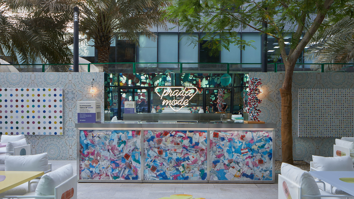 Custom outdoor counters fabricated to continue the Prada Mode visual language.
