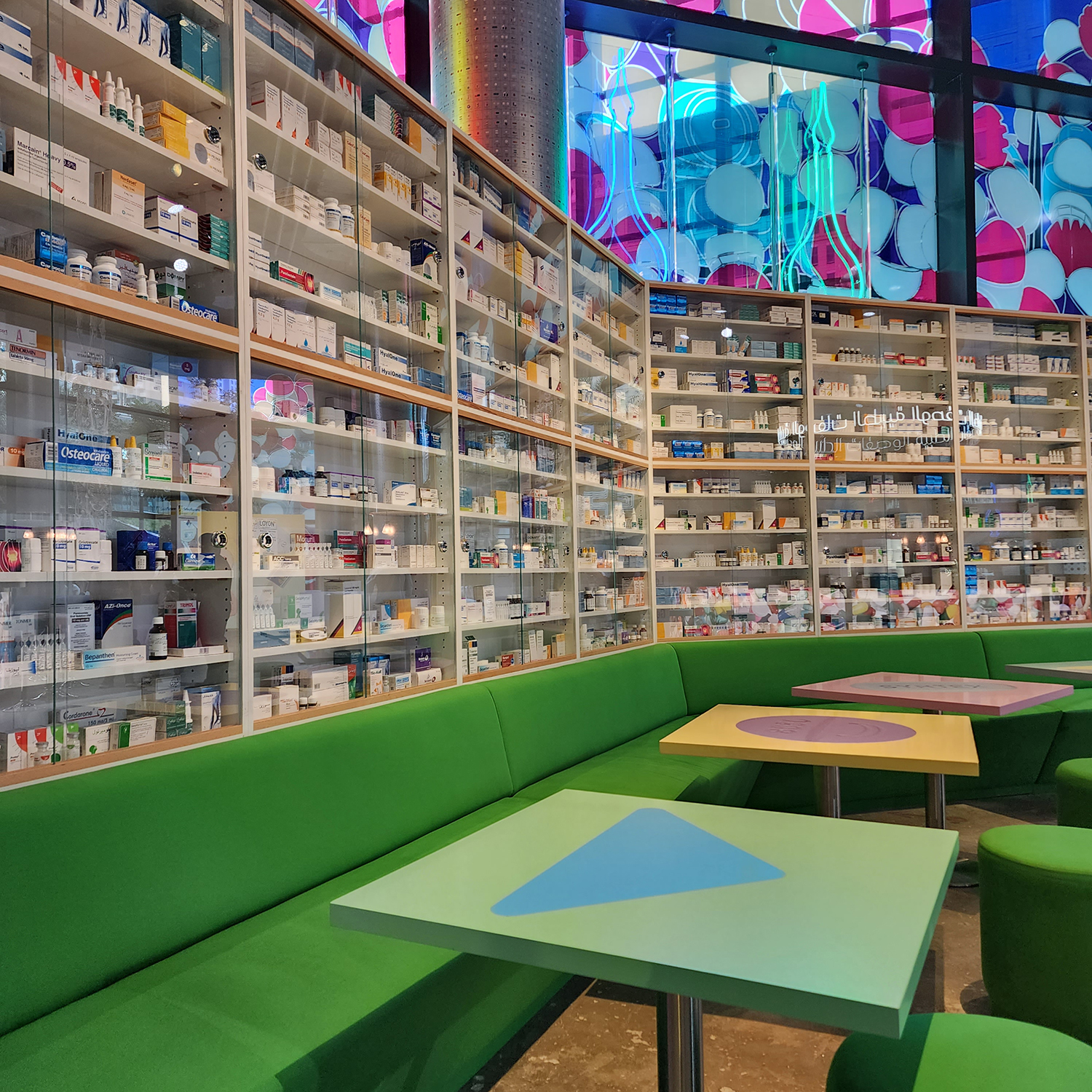 Pharmacy-style display cabinets installed within Prada Mode at ICD Brookfield Place.
