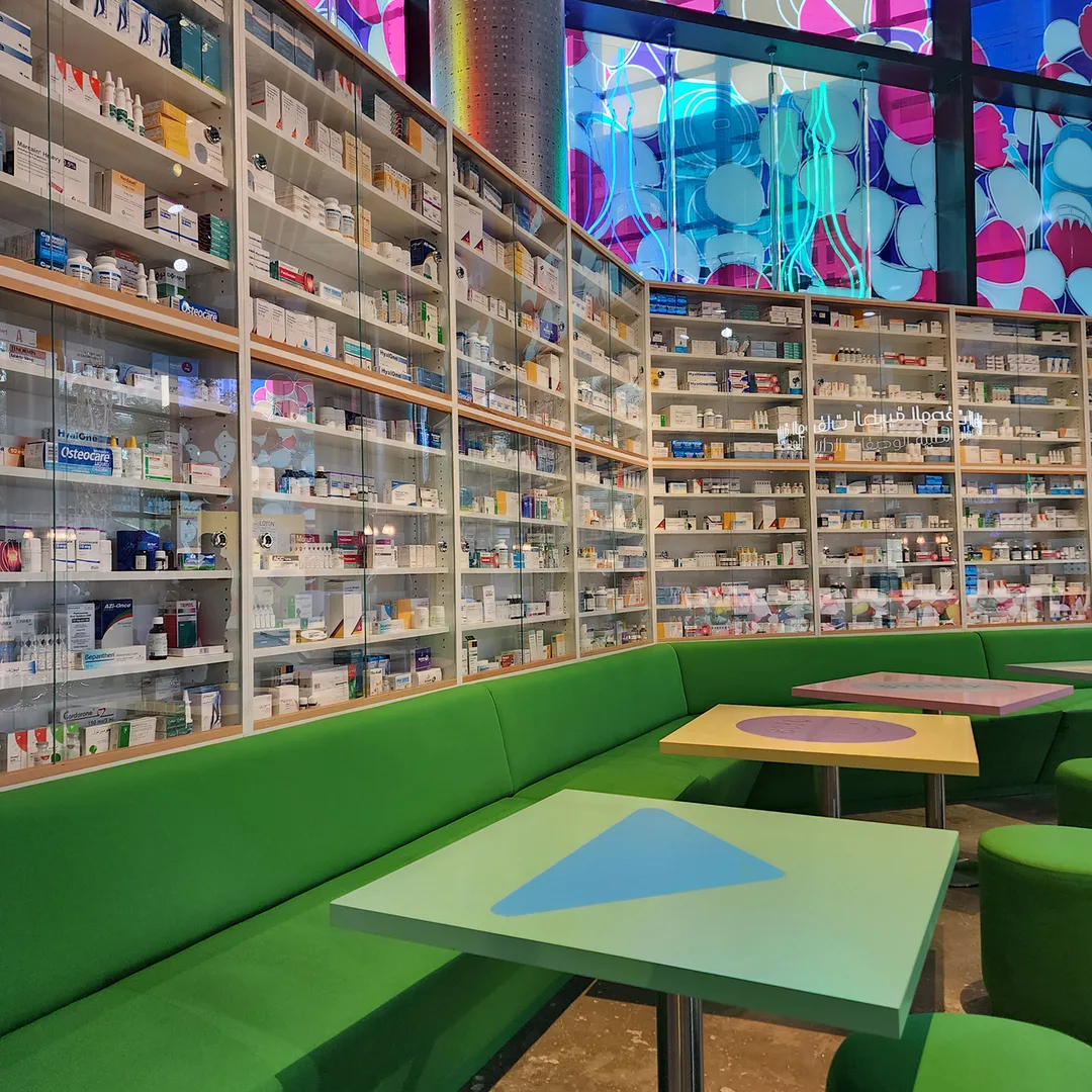 Pharmacy-style display cabinets installed within Prada Mode at ICD Brookfield Place.

