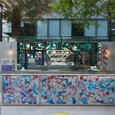 prada-mode-sustainability-event-recycled-plastic-installation.webp