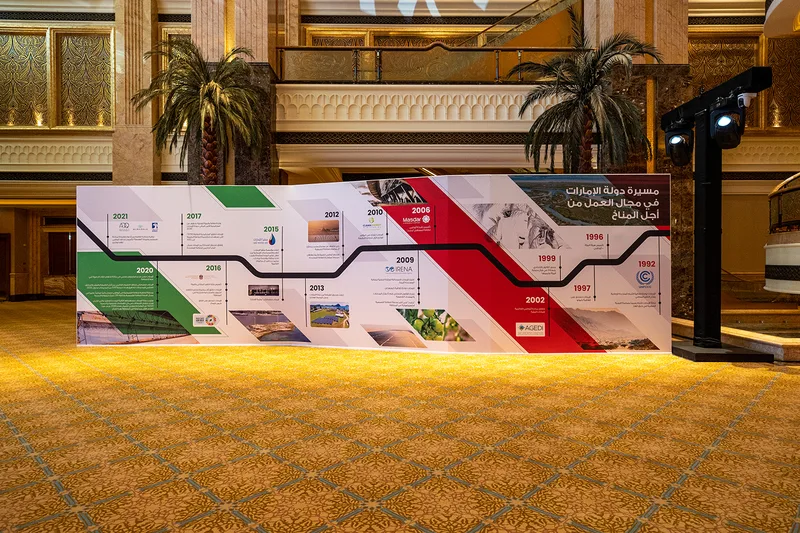 Printed scenic panels carrying UAE Regional Climate Dialogue branding at Emirates Palace.