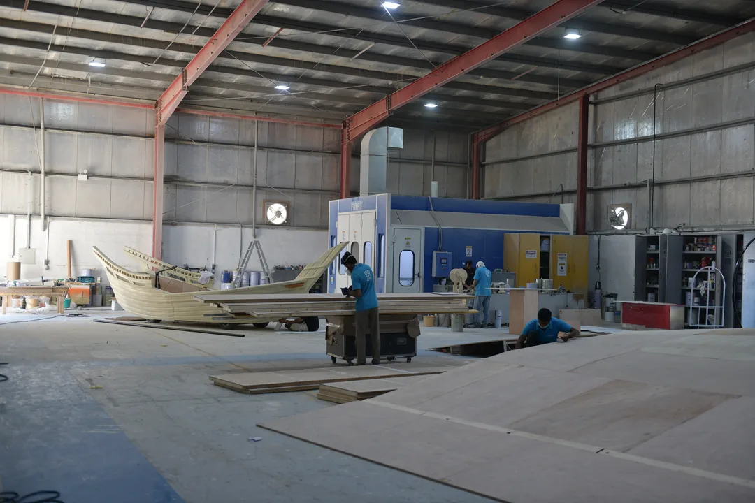 Alternative timber and metal build methods for the same scenic wall design
