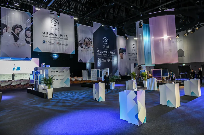 Evolution Scenic modular Qudwa–PISA forum environment combining the stage, Media Hub and branded scenic elements.