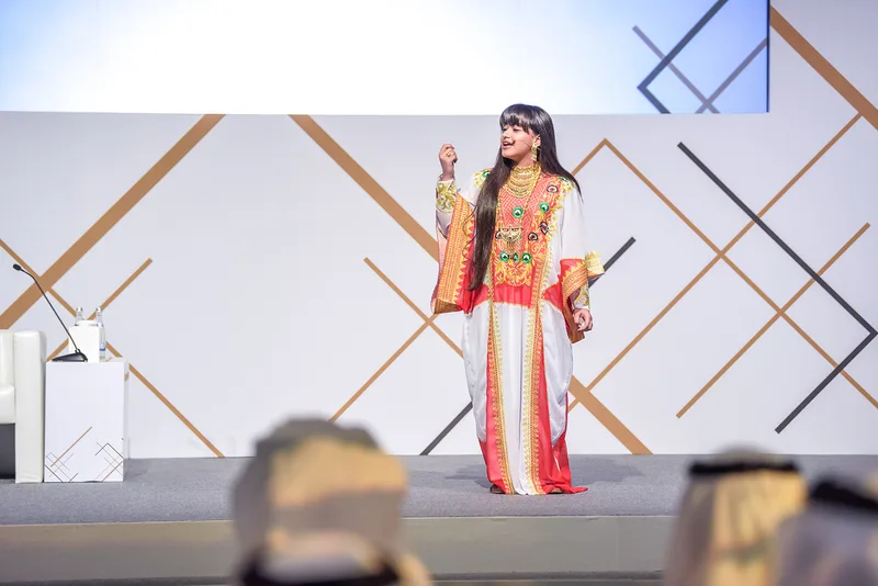 Sandooq Al Watan scenic stage finished with Delta carpet and geometric branding.