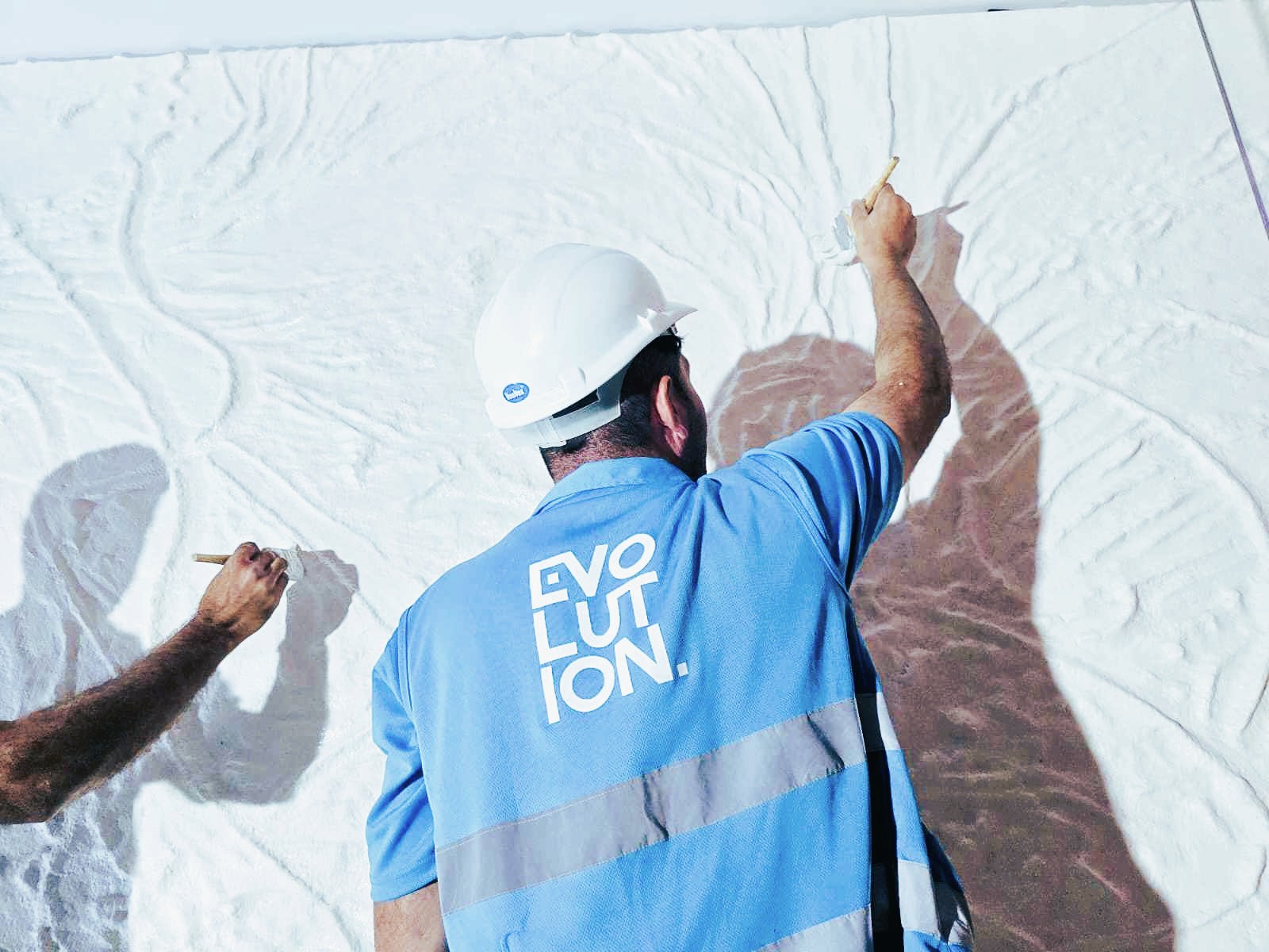 Scenic painting and textured finish production for durable long-term museum display environments.