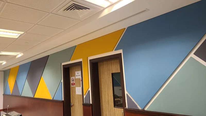 Evolution Scenic school fit-out combining graphics, joinery, seating and acoustic treatments