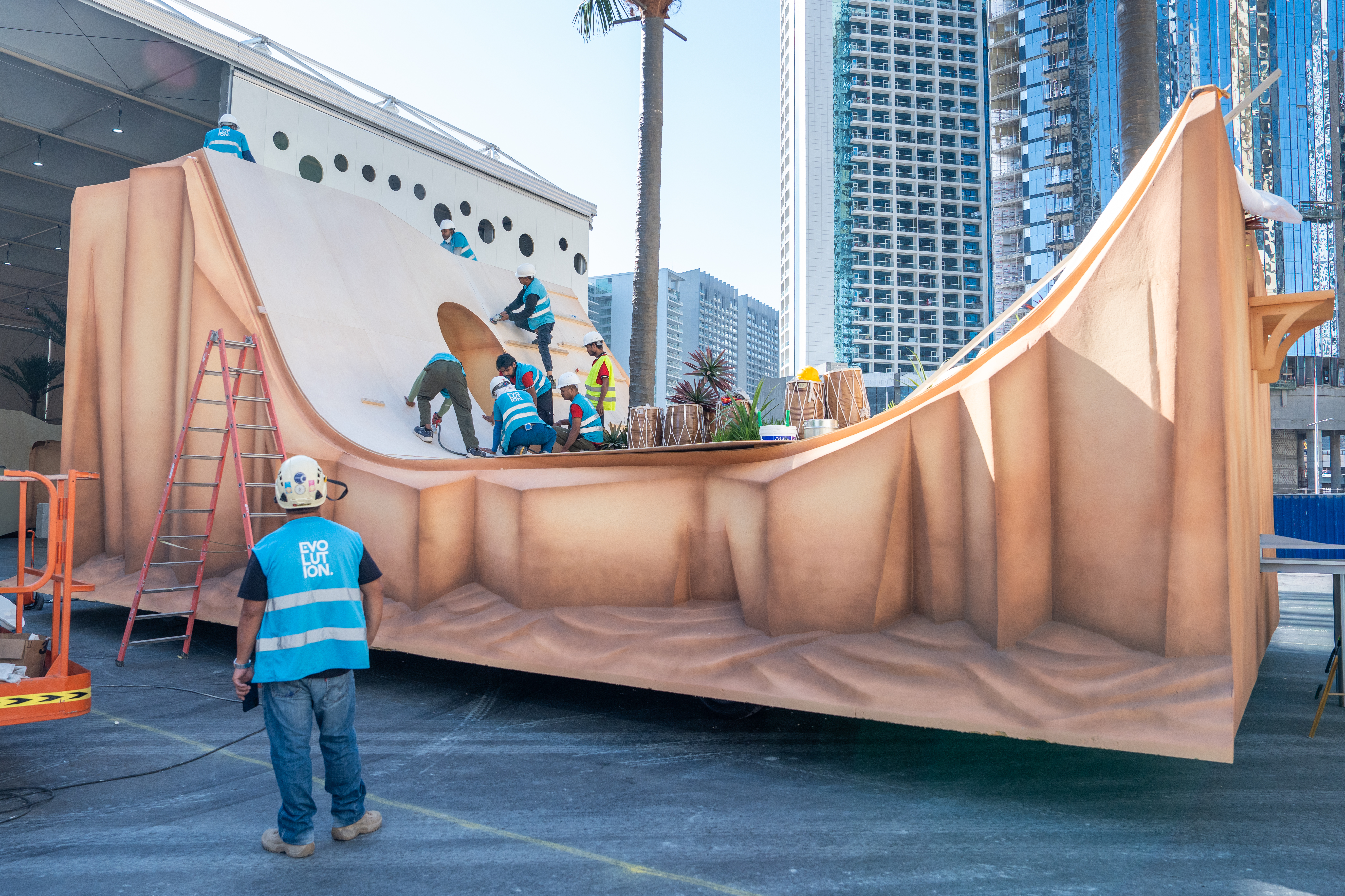 Finished parade float inspected for secure scenic fixings and safe external edges.