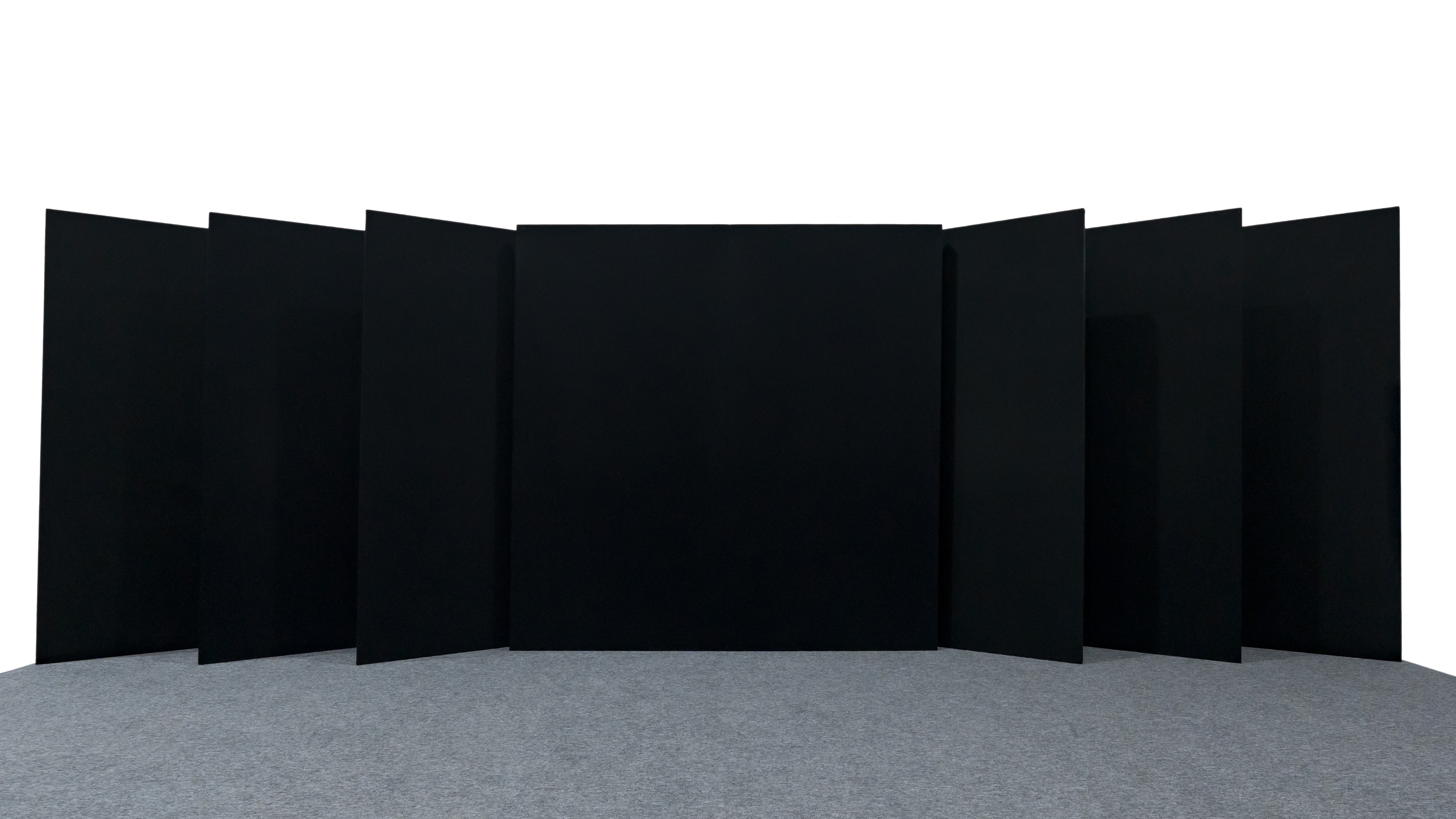 Scenic partition mock-ups comparing acoustic panels, opaque drape and impact-resistant construction.
