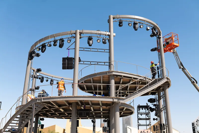 Evolution Scenic steel-framed performance structure with circular platforms and integrated lighting.