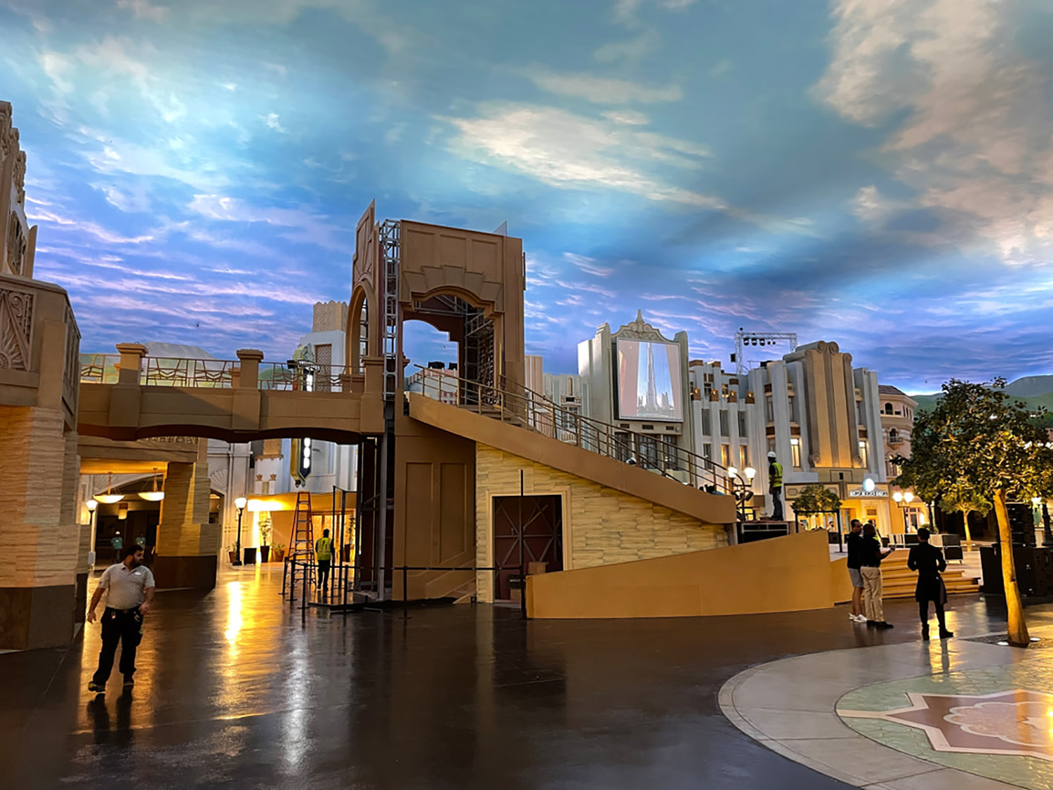 Custom scenic construction combining load-bearing steelwork with lightweight architectural cladding and formed details.
