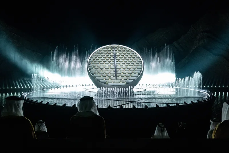 Telescopic lightbox buildings with individually controlled internal LED lighting.