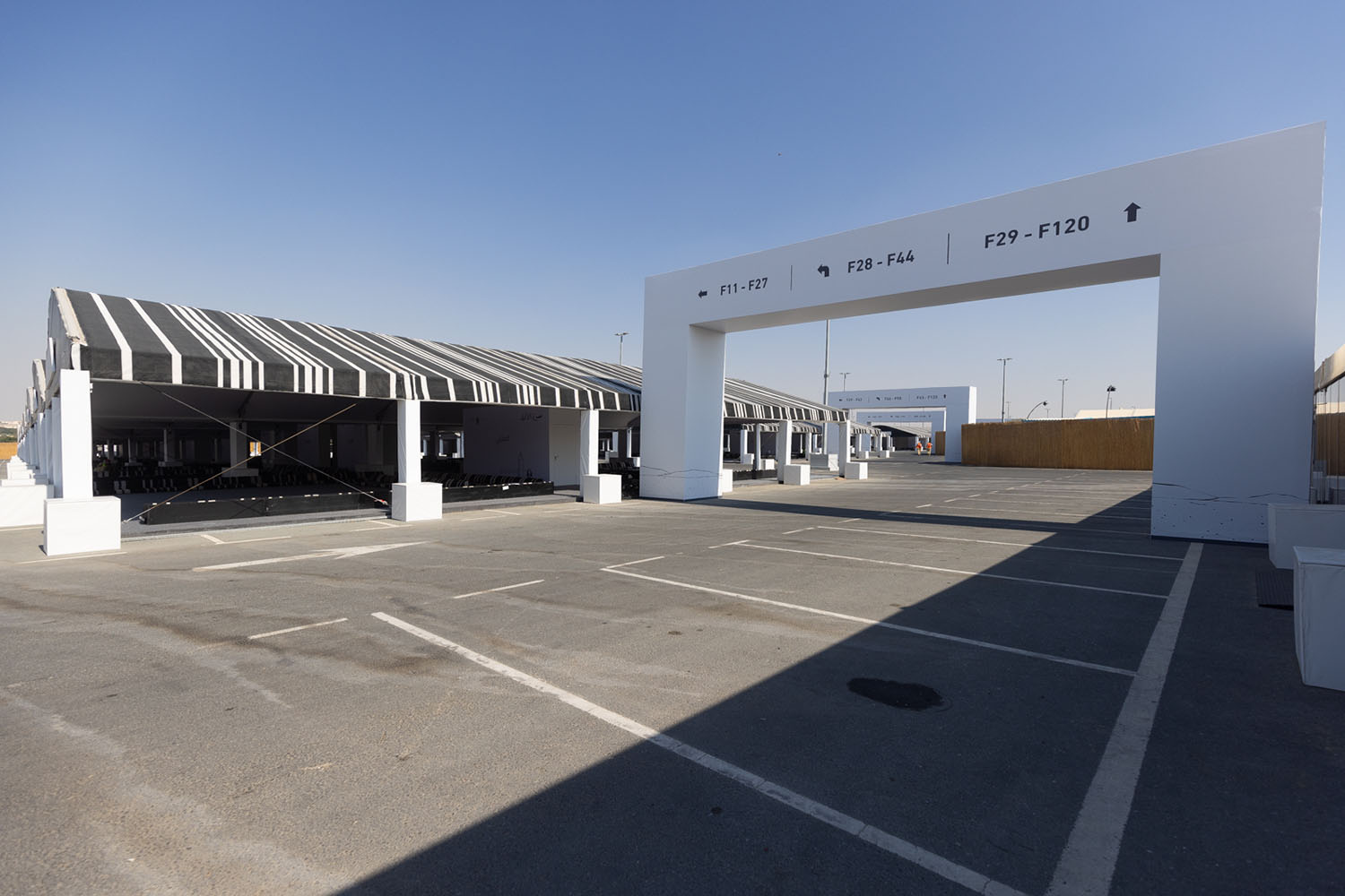 Temporary scenic structures combining decorative fabrication, technical integration and safe public access.
