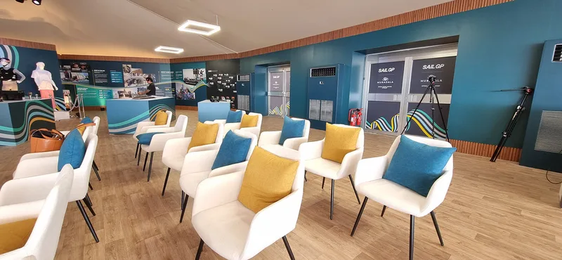 Evolution Scenic three-metre walling with plastic wood-effect slats and vinyl graphics.